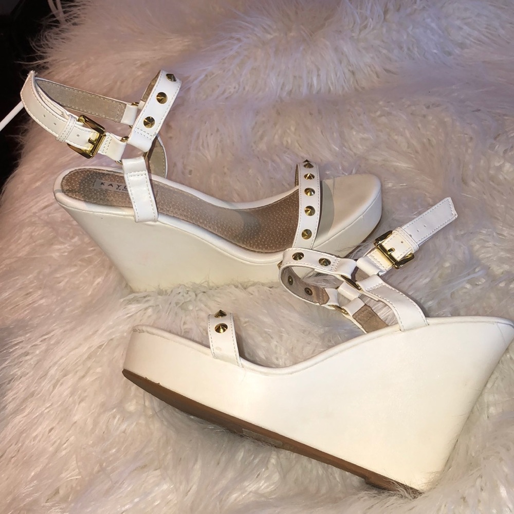 White and gold used wedges